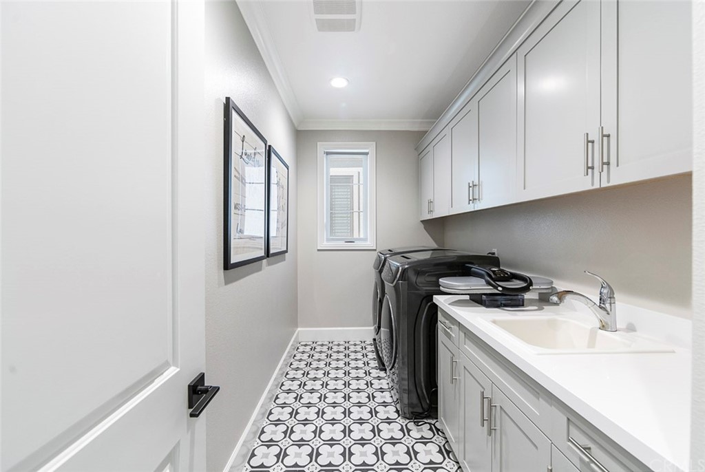 65 Rockinghorse Irvine, CA 92602 - Photo 31 of 43 a kitchen with a sink stove and refrigerator