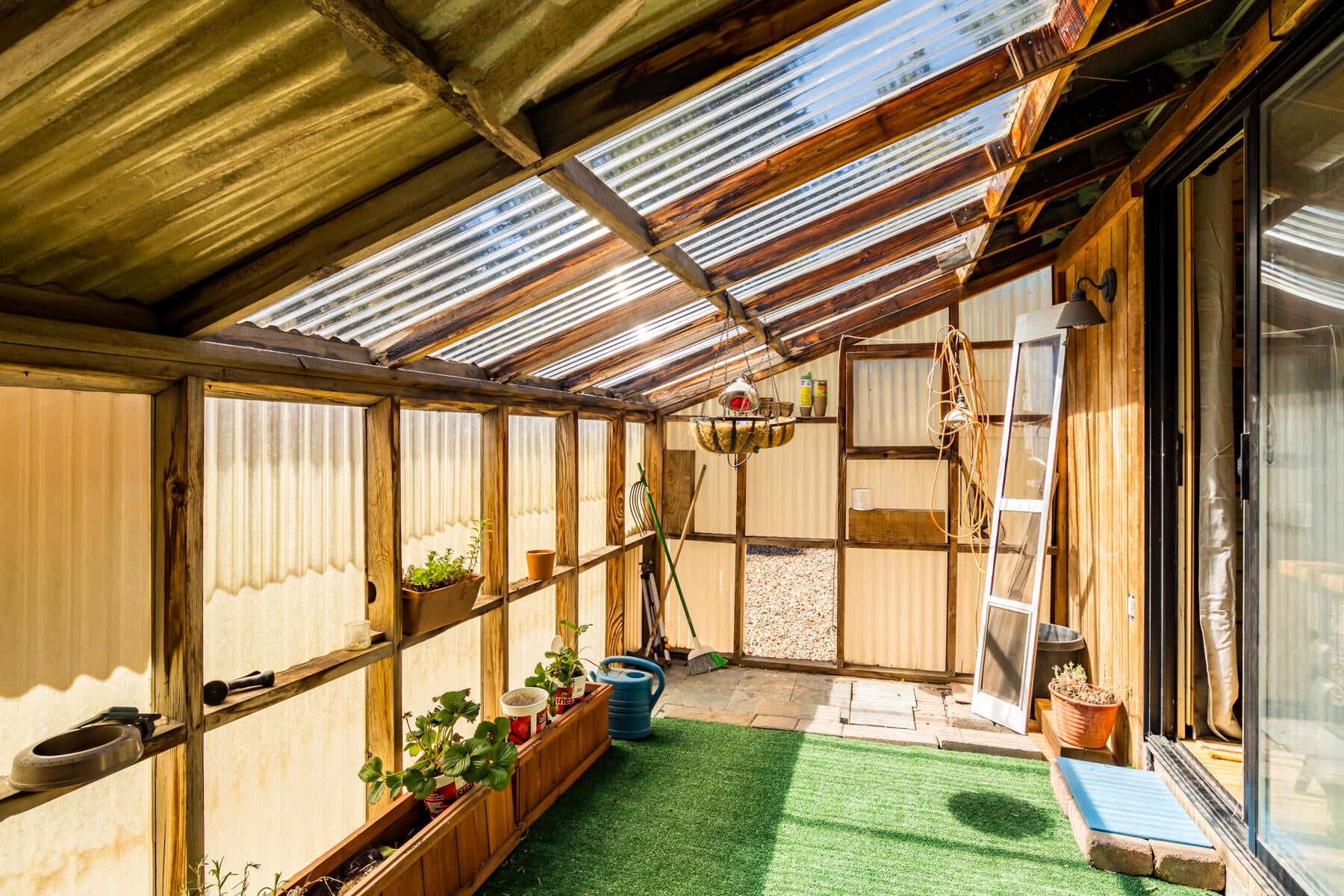 60169 Cheyenne Road Bend, OR 97702 - Photo 32 of 39 Greenhouse next to bonus room area