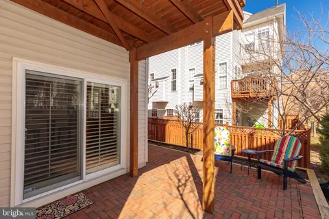 a view of balcony with a patio