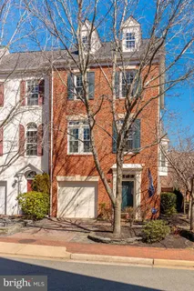 a view of a house with a street
