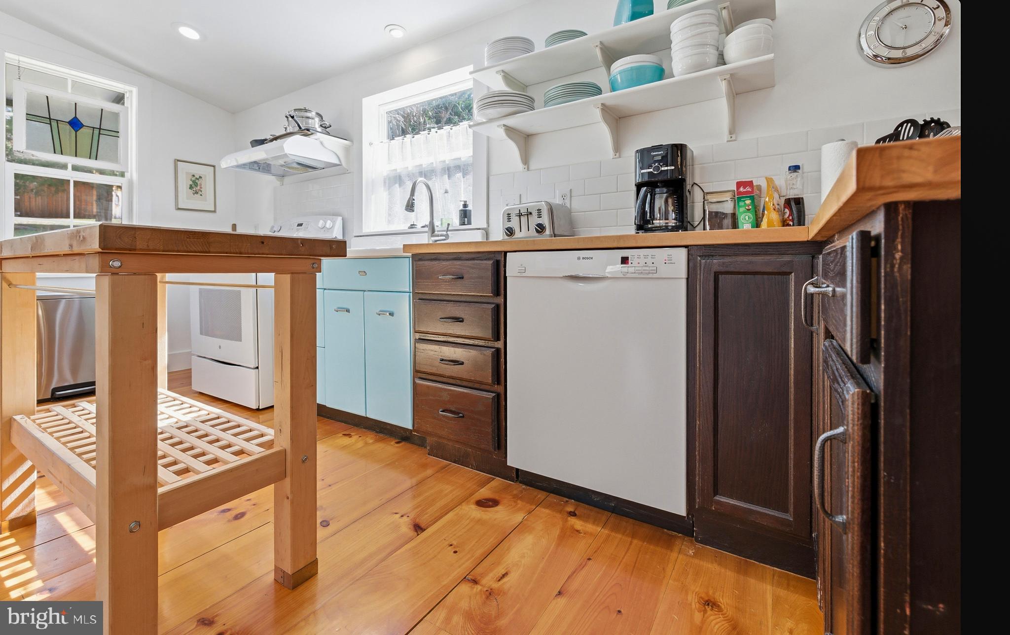 769 Rocky Branch Road Luray, VA 22835 - Photo 17 of 94 a kitchen with stainless steel appliances kitchen island granite countertop a refrigerator and a stove top oven
