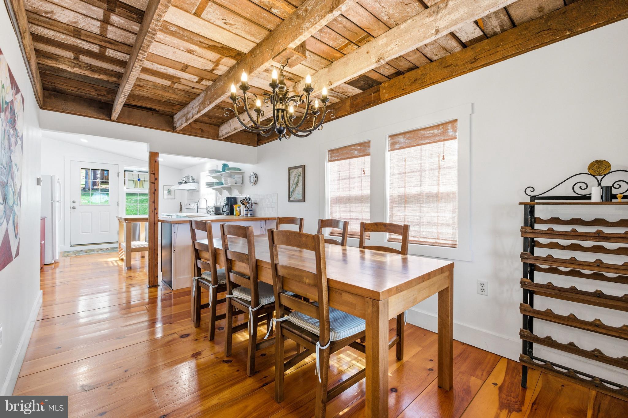 769 Rocky Branch Road Luray, VA 22835 - Photo 21 of 94 a view of a dining room with furniture window and wooden floor