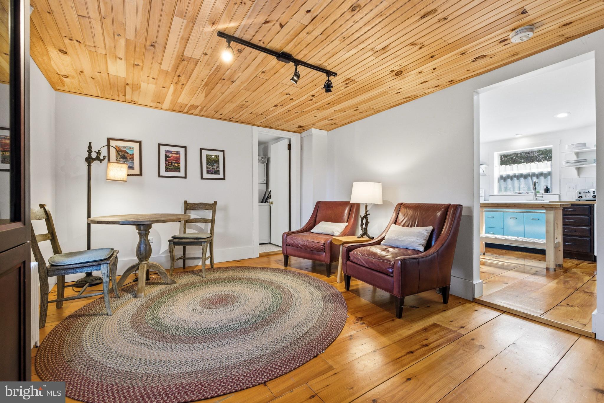 769 Rocky Branch Road Luray, VA 22835 - Photo 27 of 94 a living room with furniture and a wooden floor