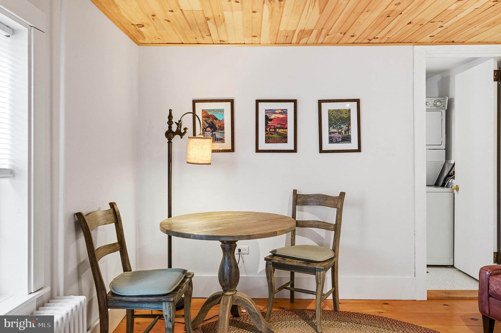 769 Rocky Branch Road Luray, VA 22835 - Photo 31 of 94 a view of a dining room with furniture and wooden floor