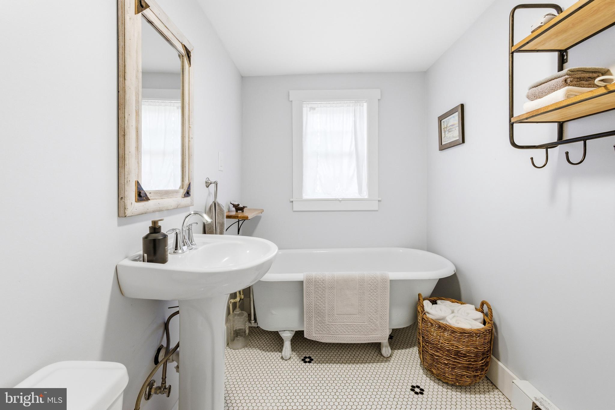 769 Rocky Branch Road Luray, VA 22835 - Photo 33 of 94 a bathroom with a sink and a mirror