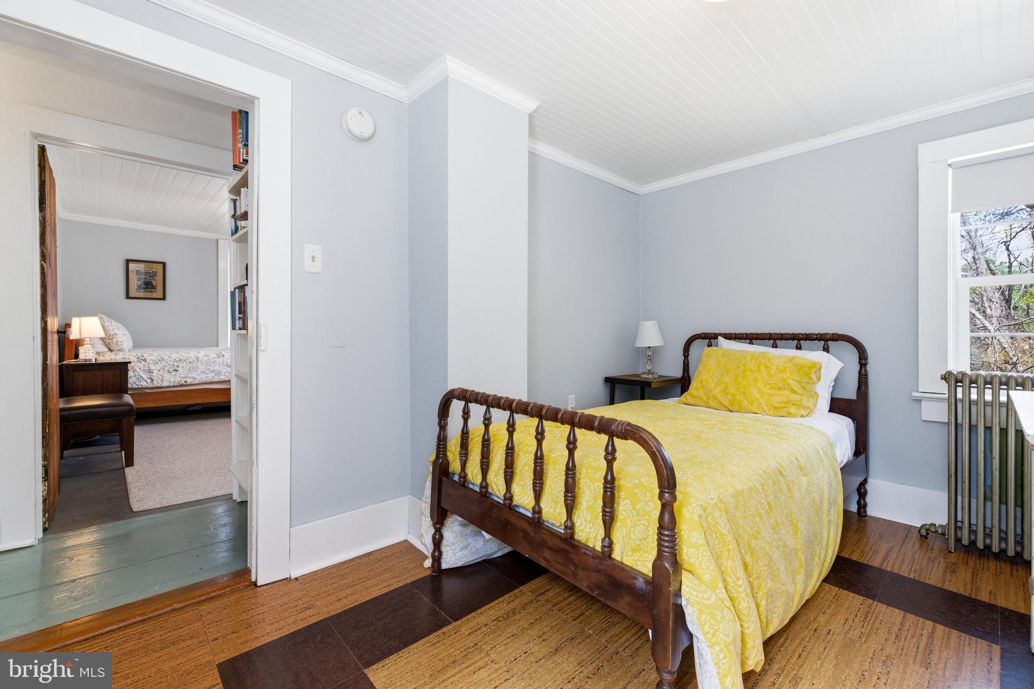 769 Rocky Branch Road Luray, VA 22835 - Photo 36 of 94 a bedroom with a bed and wooden floor