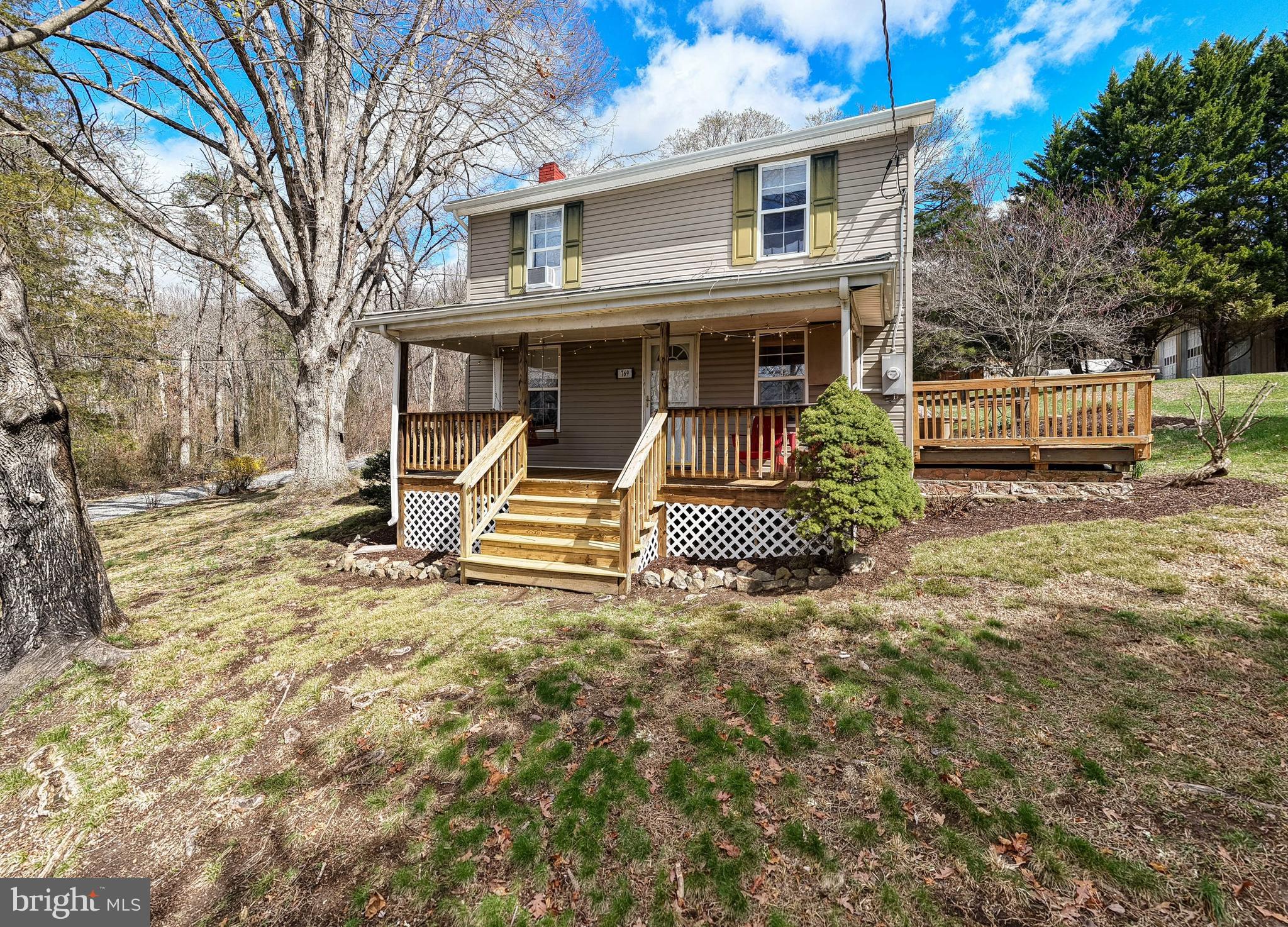769 Rocky Branch Road Luray, VA 22835 - Photo 48 of 94 a front view of a house with a yard