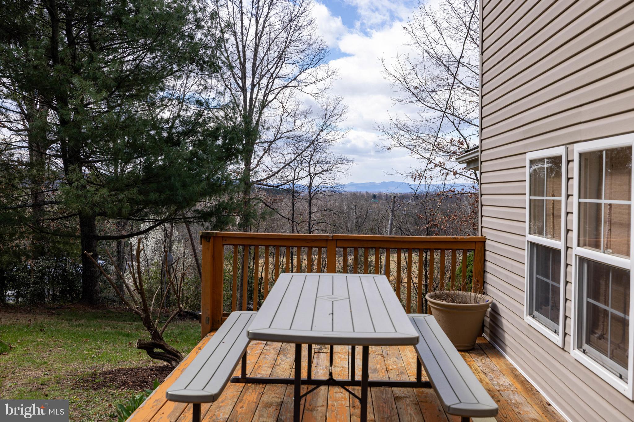 769 Rocky Branch Road Luray, VA 22835 - Photo 55 of 94 a view of balcony with wooden floor and outdoor seating