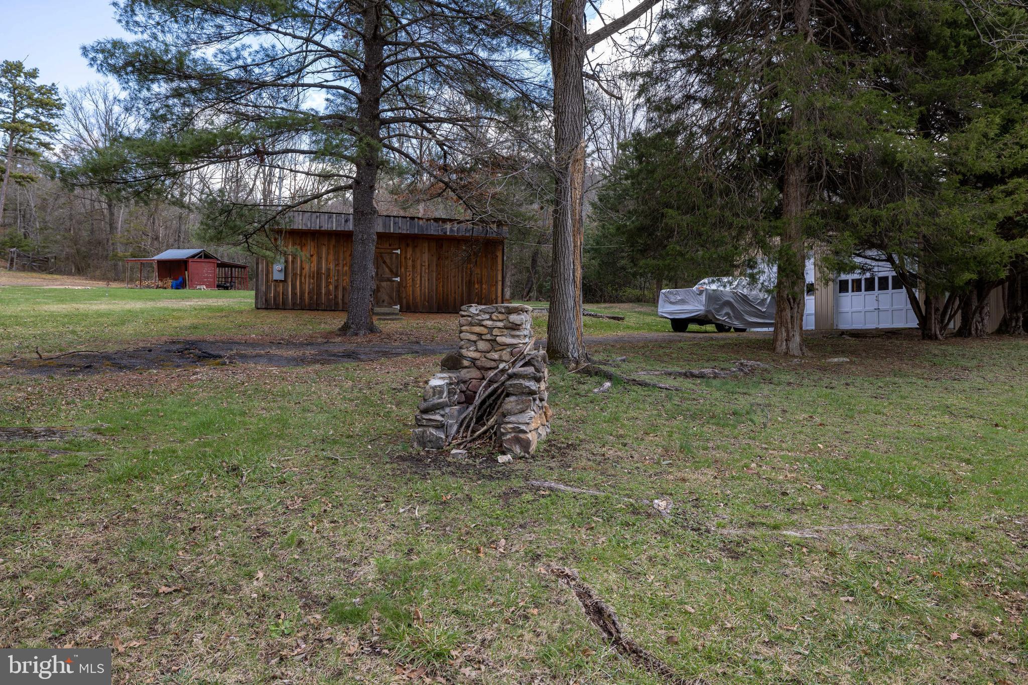 769 Rocky Branch Road Luray, VA 22835 - Photo 62 of 94 a view of a backyard with a car park