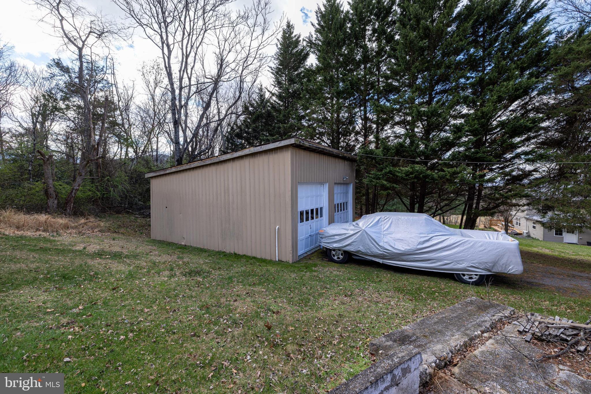 769 Rocky Branch Road Luray, VA 22835 - Photo 69 of 94 a view of a house with a yard and wooden fence