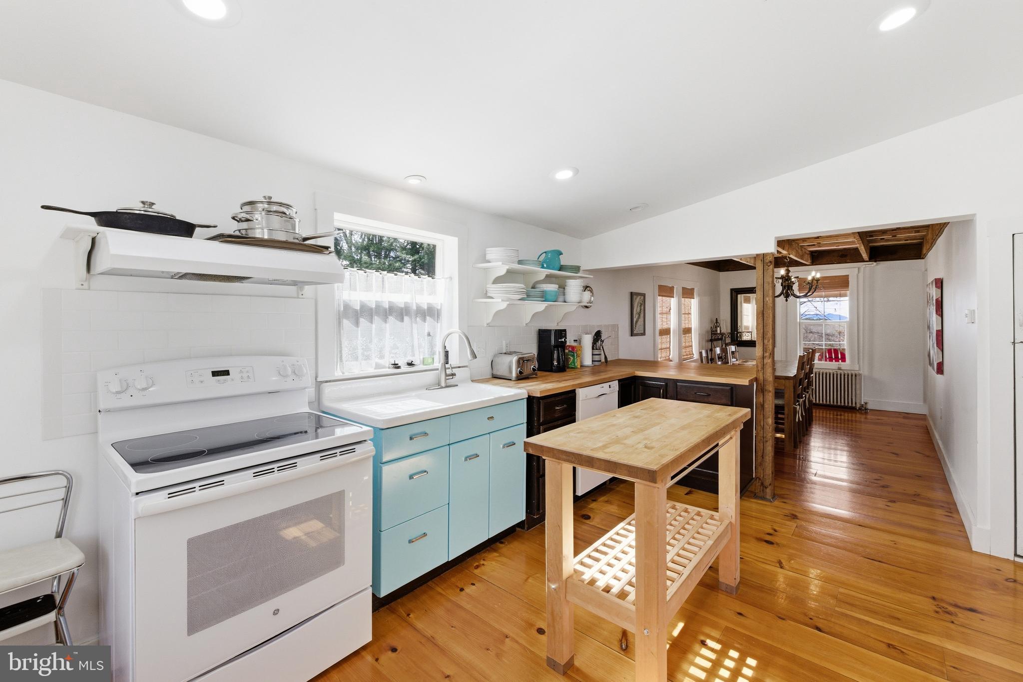 769 Rocky Branch Road Luray, VA 22835 - Photo 7 of 94 a kitchen with sink cabinets and stove top oven