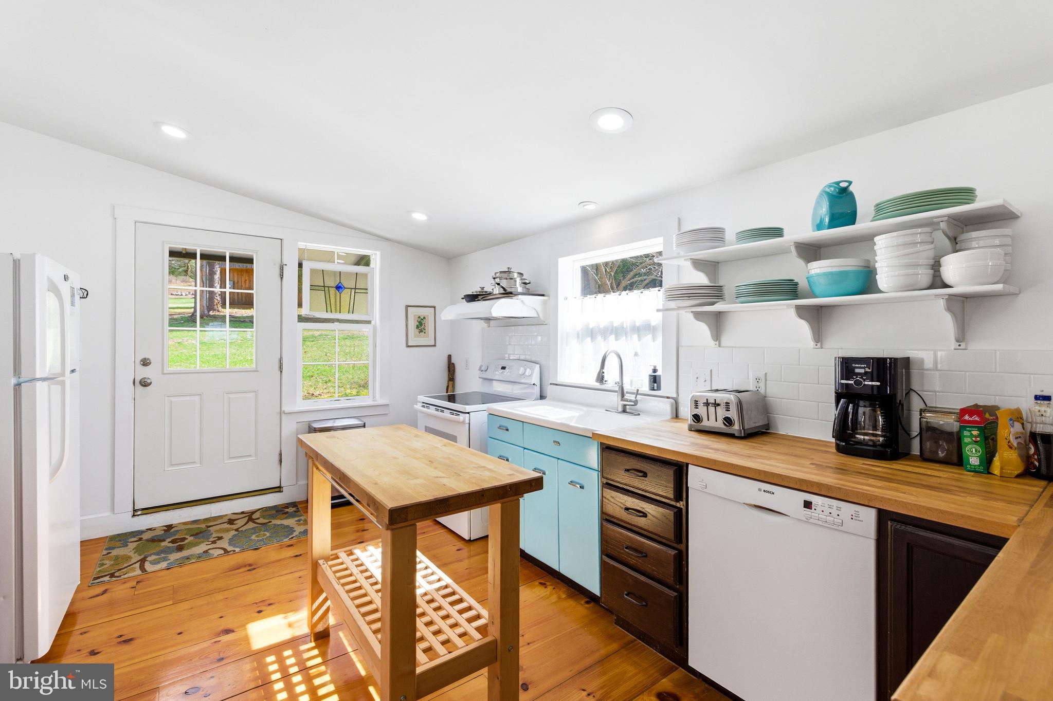 769 Rocky Branch Road Luray, VA 22835 - Photo 9 of 94 a kitchen with stainless steel appliances granite countertop a sink stove and refrigerator