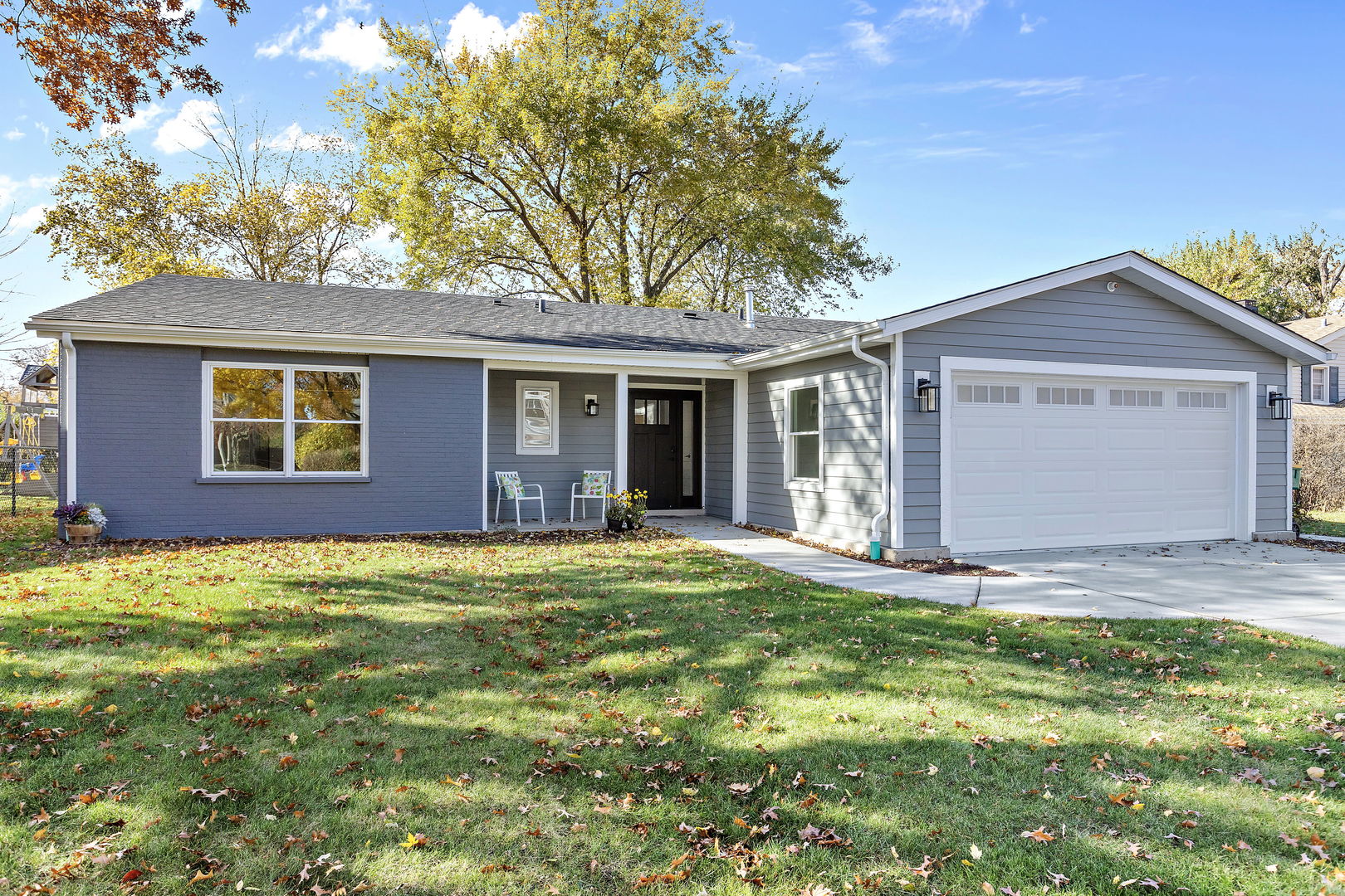 1044 Greenridge Road Buffalo Grove, IL 60089 - Photo 1 of 19 a view of a house with a yard