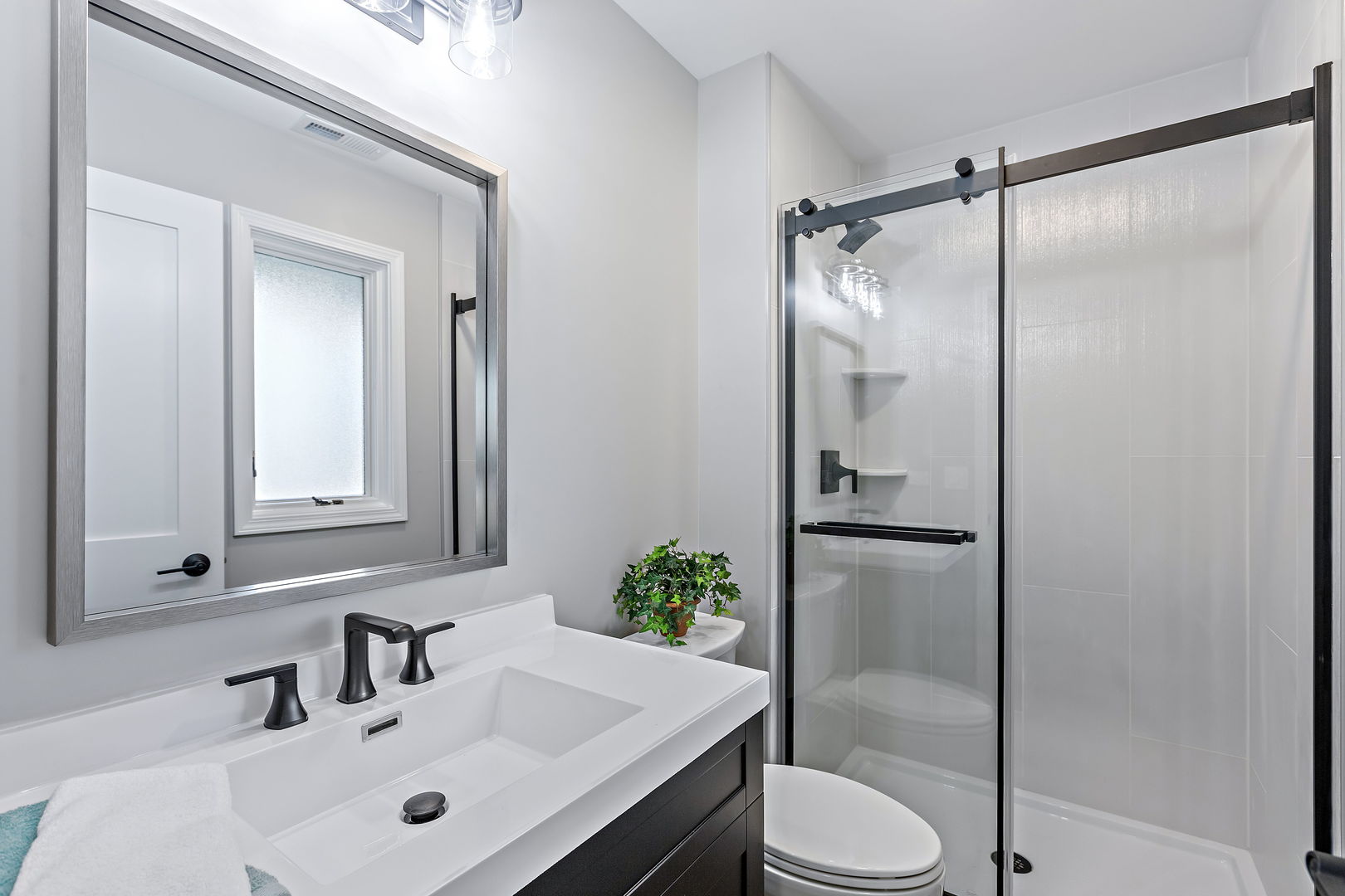 1044 Greenridge Road Buffalo Grove, IL 60089 - Photo 15 of 19 a bathroom with a sink toilet and shower