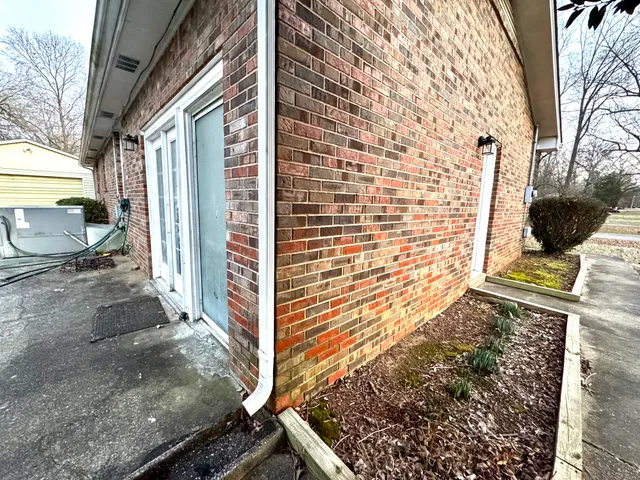 a house view with a backyard space