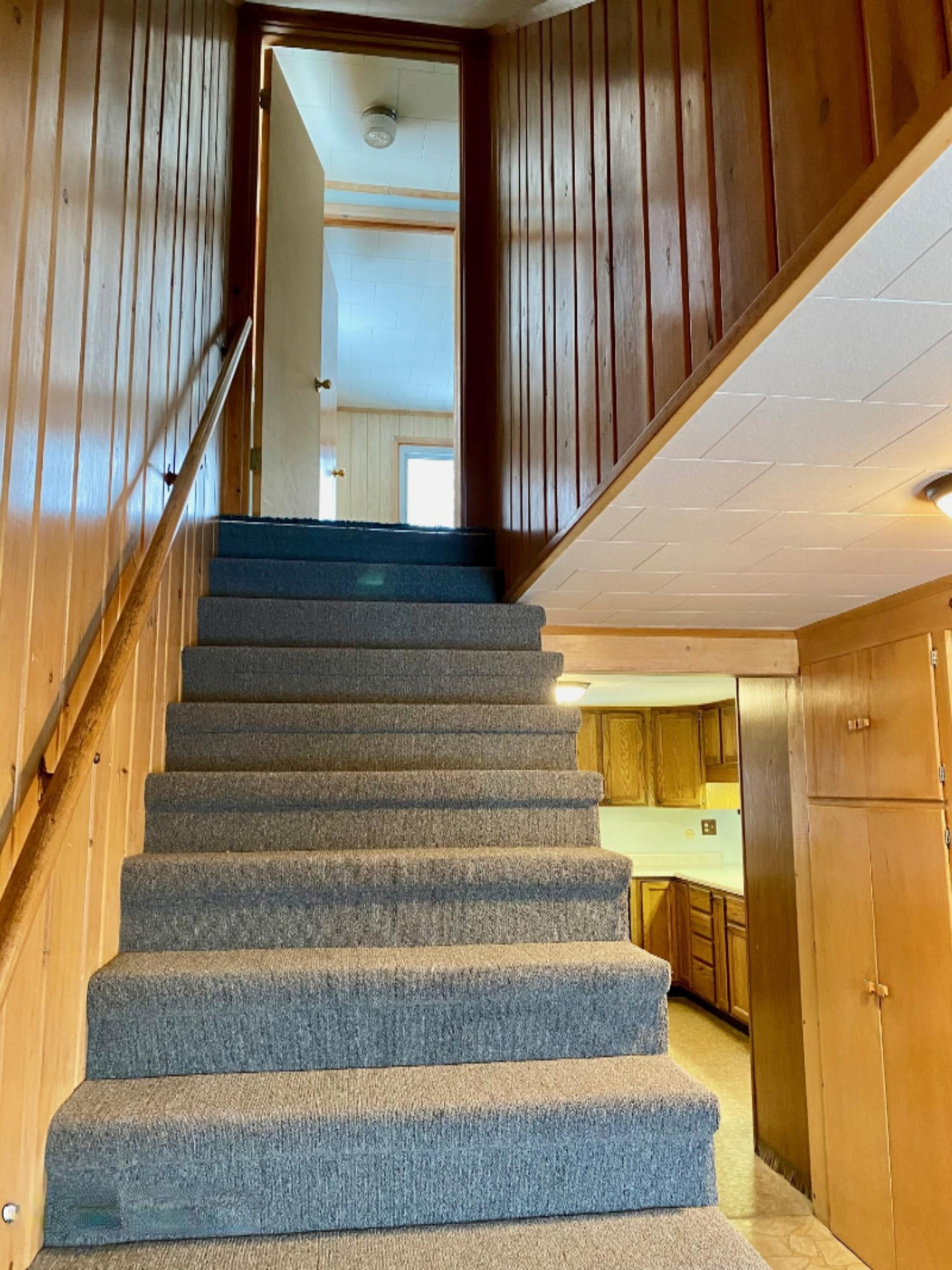 4824 Maidens Road Onekama, MI 49675 - Photo 25 of 56 stairs to upper fl.