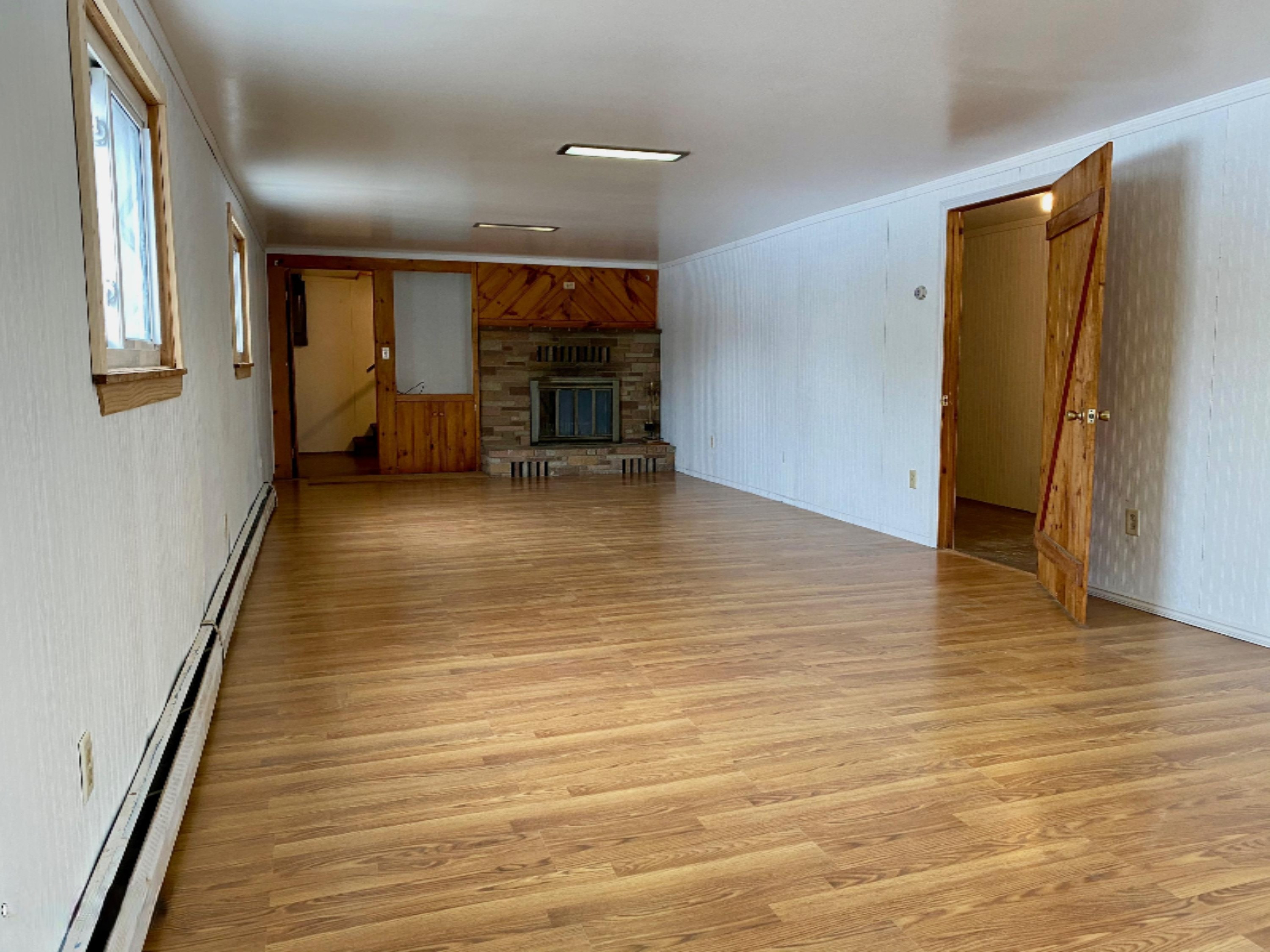 4824 Maidens Road Onekama, MI 49675 - Photo 37 of 56 basement living room