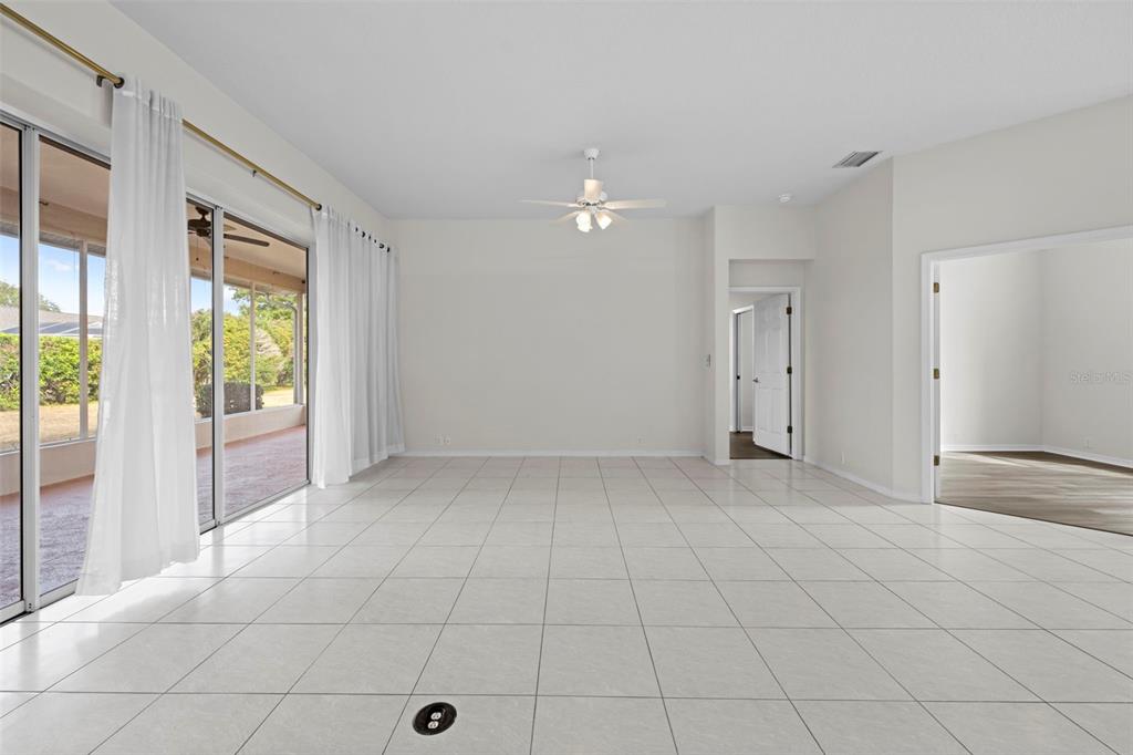 9369 Ashley Drive Weeki Wachee, FL 34613 - Photo 11 of 80 a view of an empty room with a window
