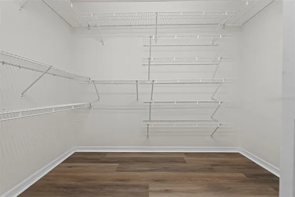 a view of a living room and a floor to ceiling window