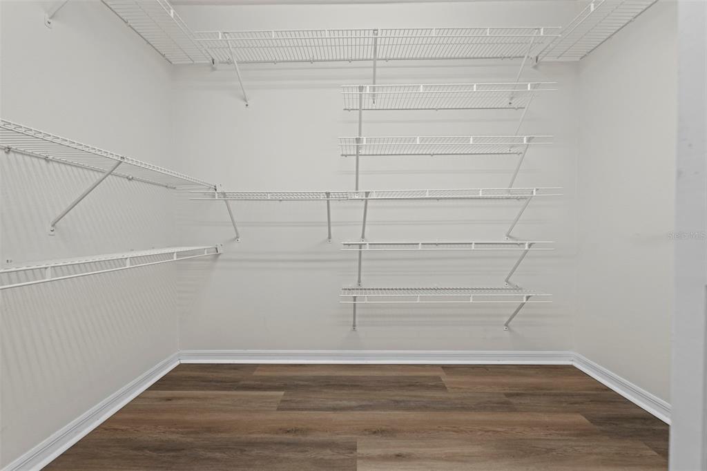 9369 Ashley Drive Weeki Wachee, FL 34613 - Photo 31 of 80 a view of a room with empty racks