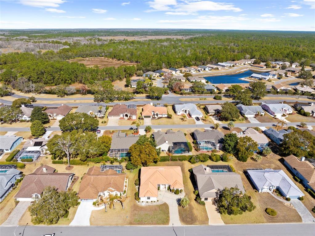 9369 Ashley Drive Weeki Wachee, FL 34613 - Photo 67 of 80 an aerial view of residential building with ocean view