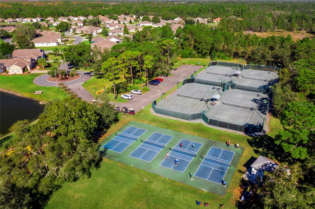9369 Ashley Drive Weeki Wachee, FL 34613 - Photo 76 of 80 an aerial view of a house with a garden