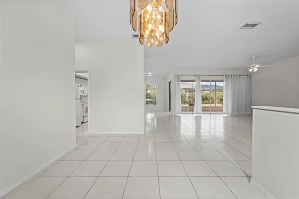 a kitchen with cabinets and stainless steel appliances