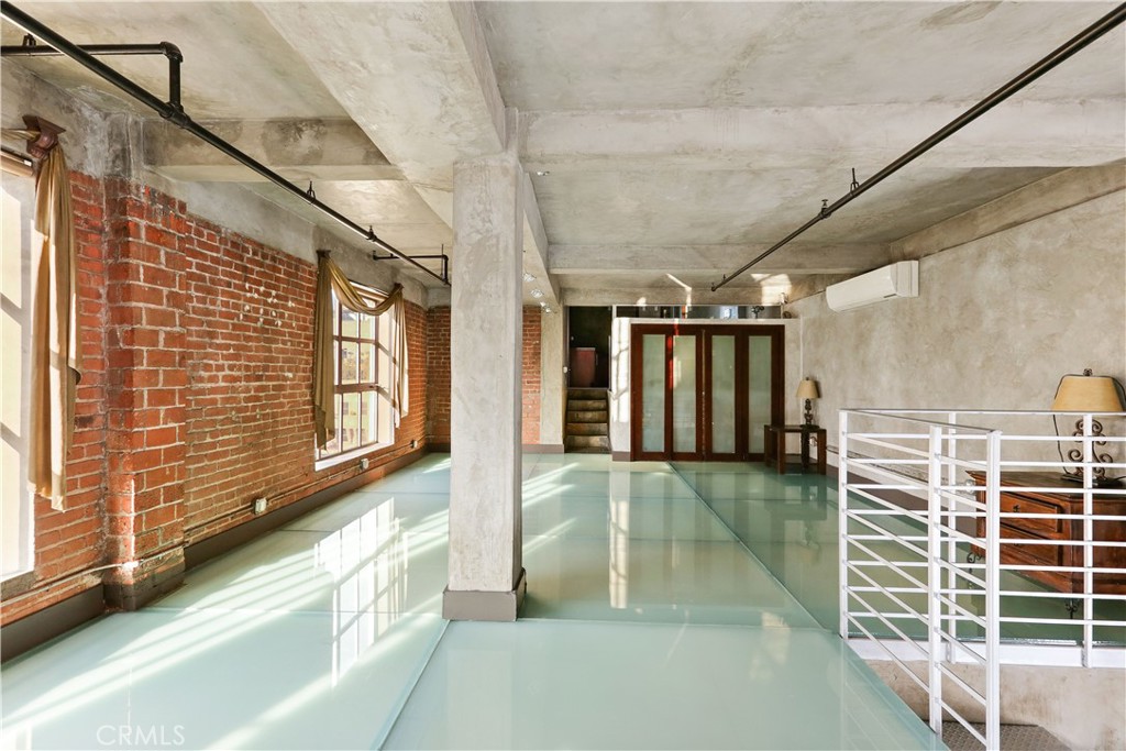 312 West 5th Street, Unit 1204 Los Angeles, CA 90013 - Photo 12 of 22 a view of a house with a balcony