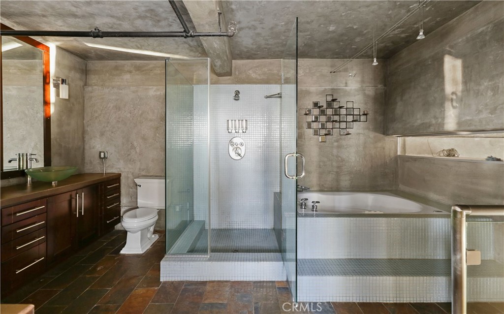 312 West 5th Street, Unit 1204 Los Angeles, CA 90013 - Photo 13 of 22 a bathroom with a shower and a sink