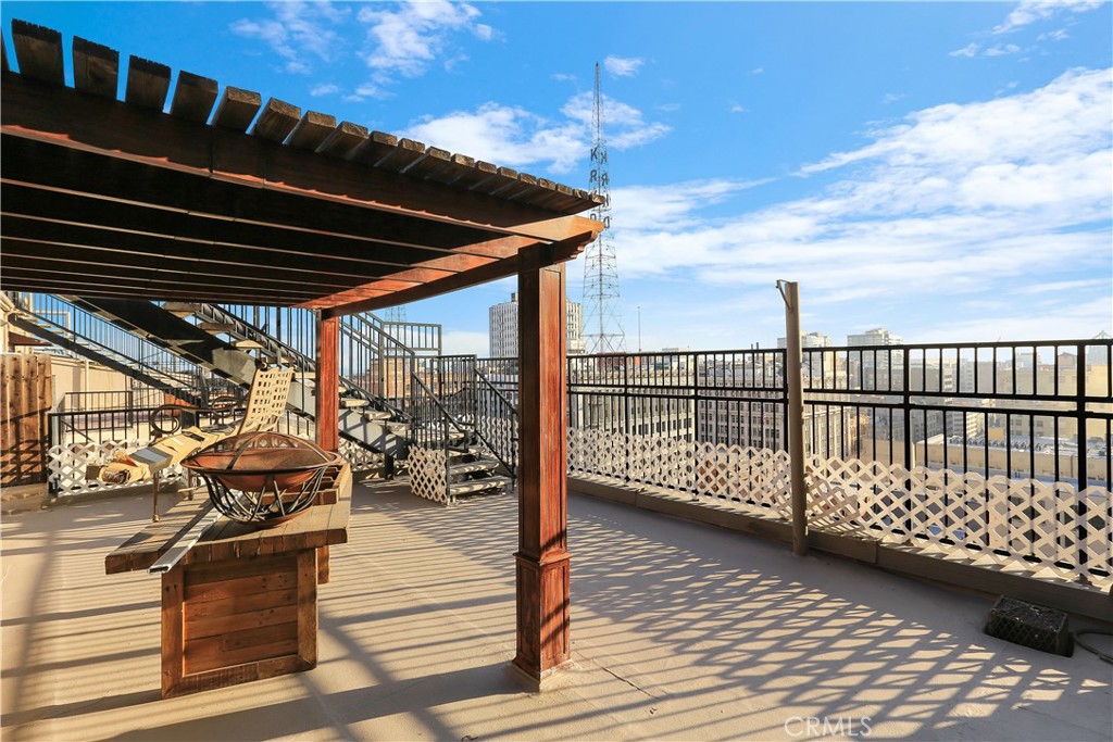 312 West 5th Street, Unit 1204 Los Angeles, CA 90013 - Photo 17 of 22 a view of a terrace with wooden floor