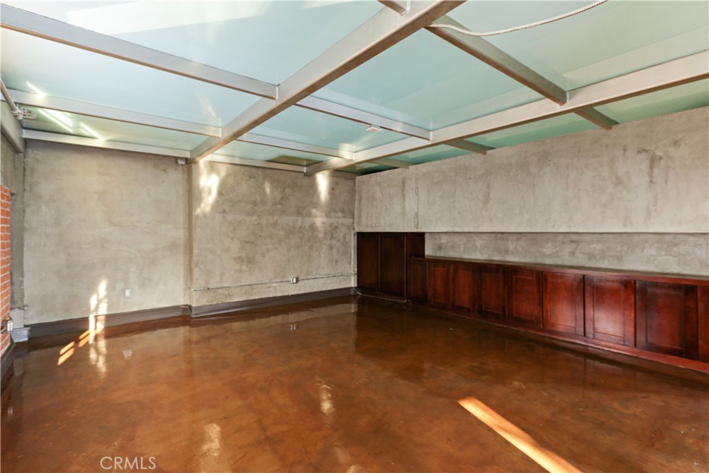 312 West 5th Street, Unit 1204 Los Angeles, CA 90013 - Photo 9 of 22 a view of an empty room with a window