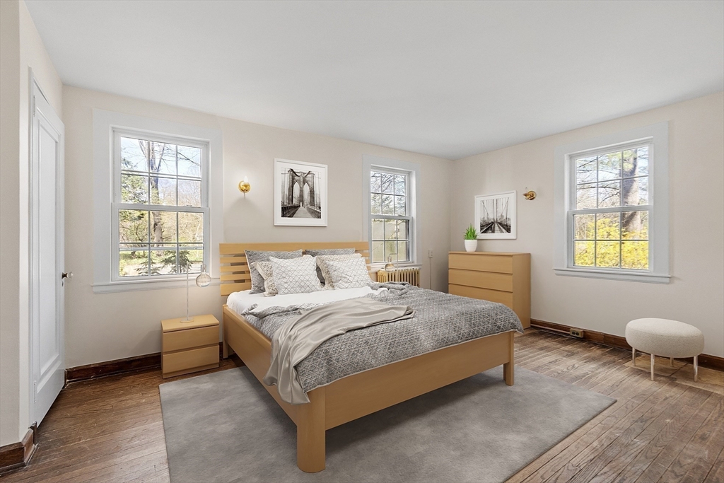 229 Musketaquid Road Concord, MA 01742 - Photo 12 of 21 a bedroom with a bed and a window