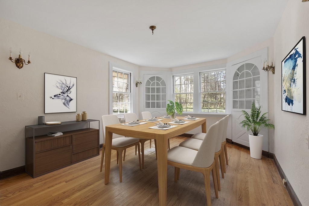 229 Musketaquid Road Concord, MA 01742 - Photo 6 of 21 a view of a dining room with furniture window and wooden floor