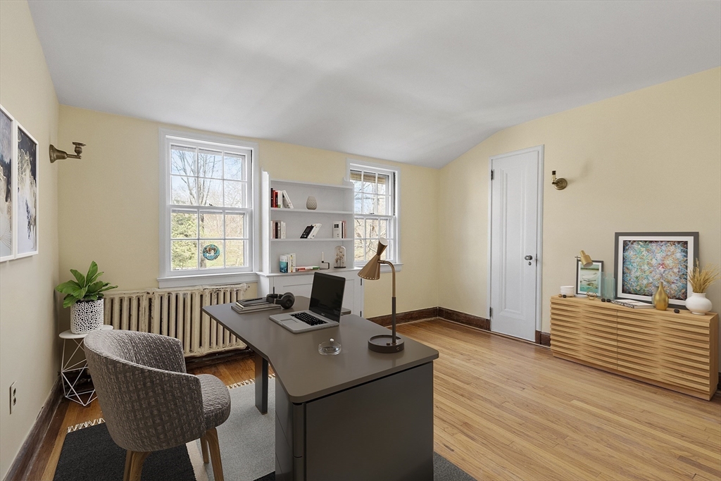 229 Musketaquid Road Concord, MA 01742 - Photo 8 of 21 a view of a workspace with furniture and a window