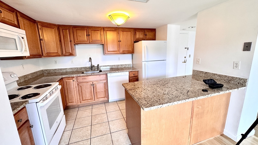 85 Brainerd Road, Unit 404 Boston, MA 02134 - Photo 1 of 15