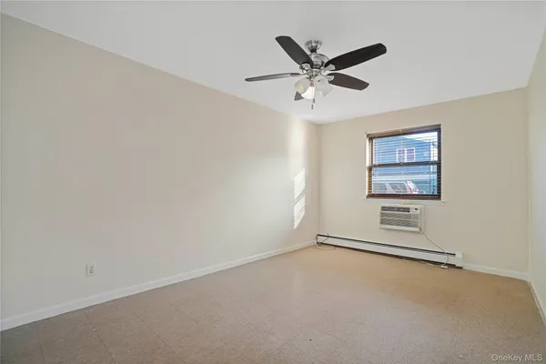 a view of a livingroom with a ceiling fan