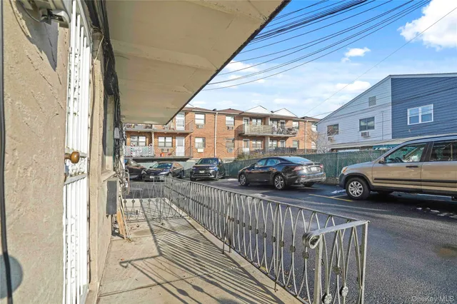 a view of a car park in front of a building