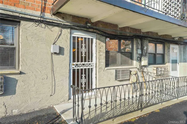 a view of a car park in front of a building