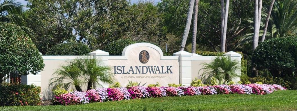 4187 St George Lane Naples, FL 34119 - Photo 1 of 33 a view of front door and sign board