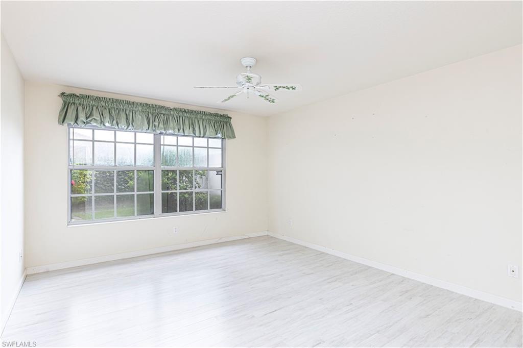4187 St George Lane Naples, FL 34119 - Photo 14 of 33 an empty room with a window