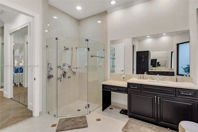 a bedroom with a bed and a television