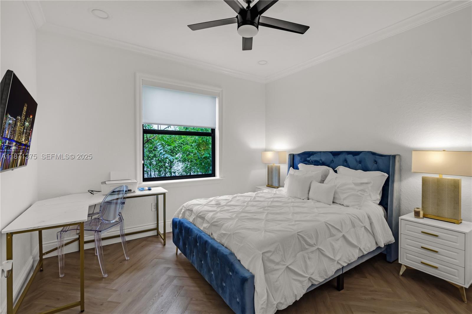 5478 Southwest 189th Avenue, Unit 5478 Miramar, FL 33029 - Photo 35 of 58 a bedroom with a bed window and a television