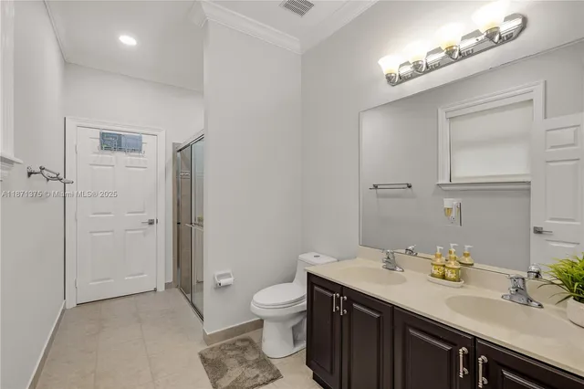 a view of a kitchen with sink dryer and washer