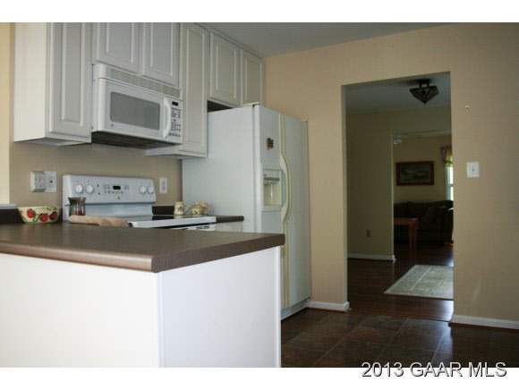 134 Overlook Road Monterey, VA 24465 - Photo 15 of 36 a kitchen with stainless steel appliances white cabinets and a refrigerator