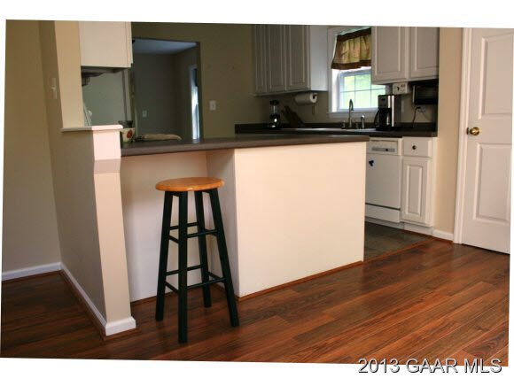 134 Overlook Road Monterey, VA 24465 - Photo 16 of 36 a kitchen with stainless steel appliances granite countertop a refrigerator and a stove top oven