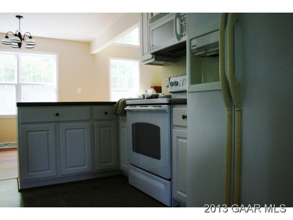 134 Overlook Road Monterey, VA 24465 - Photo 17 of 36 a kitchen with cabinets and a stove