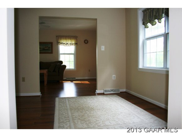134 Overlook Road Monterey, VA 24465 - Photo 22 of 36 a view of empty room with wooden floor and fan