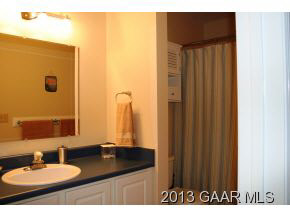 134 Overlook Road Monterey, VA 24465 - Photo 29 of 36 a bathroom with a sink and a mirror
