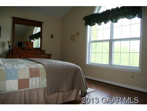 134 Overlook Road Monterey, VA 24465 - Photo 30 of 36 a bedroom with a bed and a window