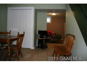 134 Overlook Road Monterey, VA 24465 - Photo 33 of 36 a living room with furniture and a flat screen tv